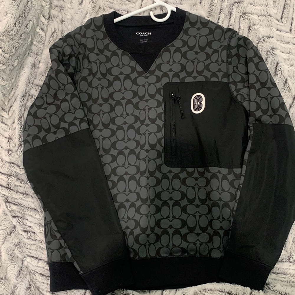 Excellent condition. Coach sweater. Size medium.